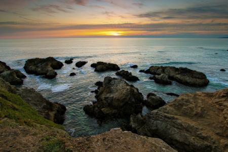 海洋，日落，岩​​石