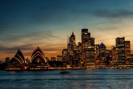 悉尼澳大利亚歌剧院悉尼澳大利亚歌剧剧院日落晚上云海水海洋摩天大楼建筑物房屋灯光景观城市