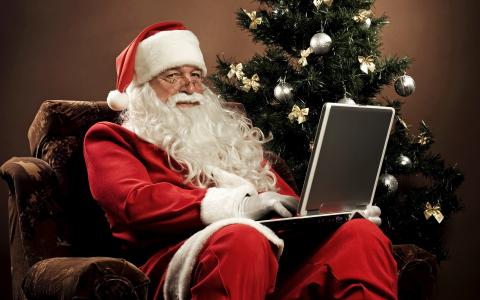 圣诞老人，手提电脑，圣诞树