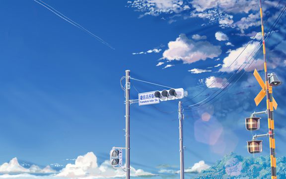 日漫蓝天下的交通信号灯